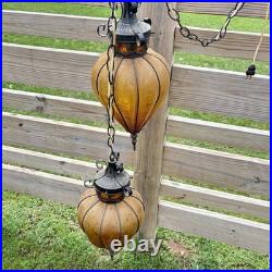 2 Vtg MCM Hanging Swag Lights/Pair Wrought Iron Caged Amber Crackle Glass Lamps