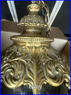 Large ScaleChained Hanging Swag Light Fixture With Smoke Glass Globe Circa 1960s
