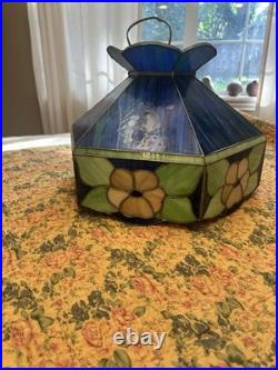 Up for Sale is a Vintage Swag Light Fixture In Blue, Green And Yellow. Works
