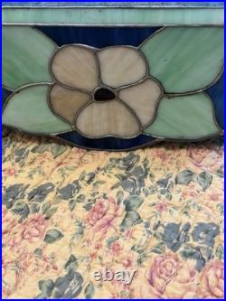 Up for Sale is a Vintage Swag Light Fixture In Blue, Green And Yellow. Works