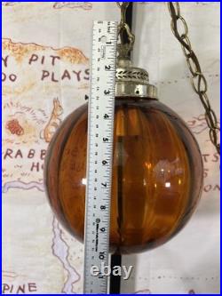 Vintage Amber Glass Hanging Swag Lamp Ribbed Globe Brass Chain Mid Century