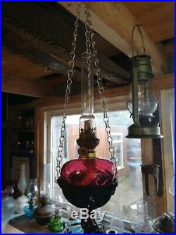Vintage Antique Hanging Cranberry Font Oil / Paraffin Lamp In Cast Iron Hanger